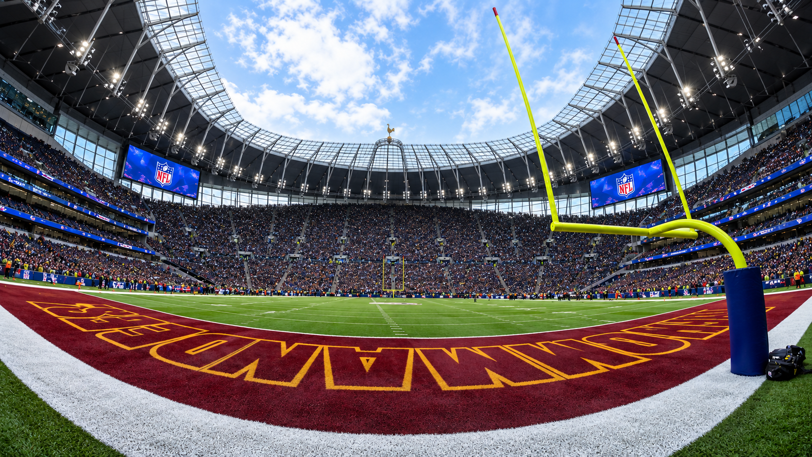 AI illustration of Tottenham Hotspur Stadium from behind the burgundy Washington Commanders end zone, with a yellow goalpost in the foreground and the South Stand beyond.