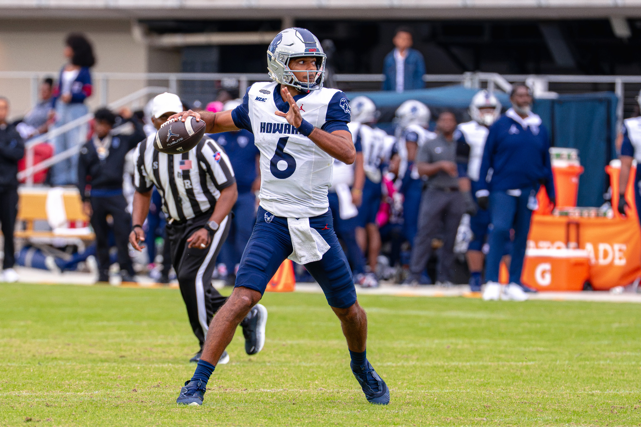Howard quarterback Ja’Shawn Scroggins prepares to throw at Audi Field