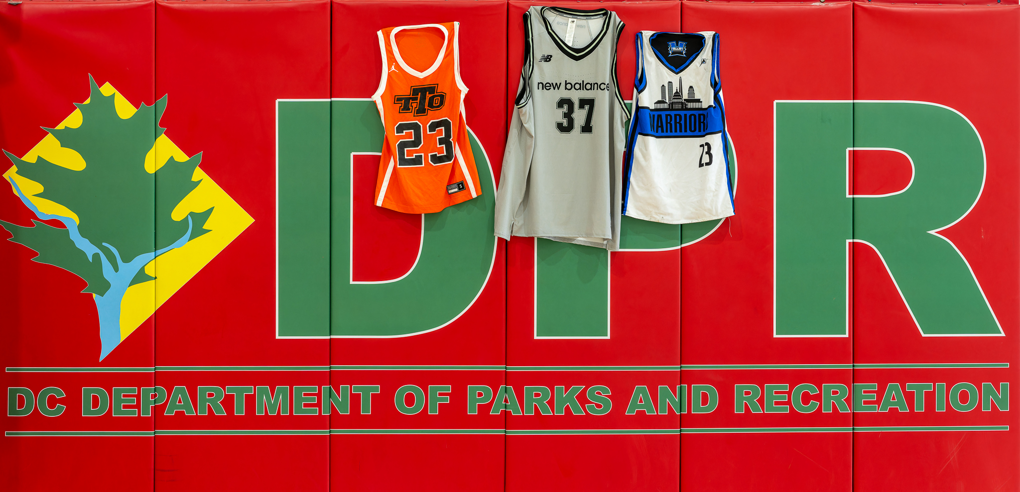 A few of the many jerseys in the Smith family's collection, hung on the gym wall for the giveaway.