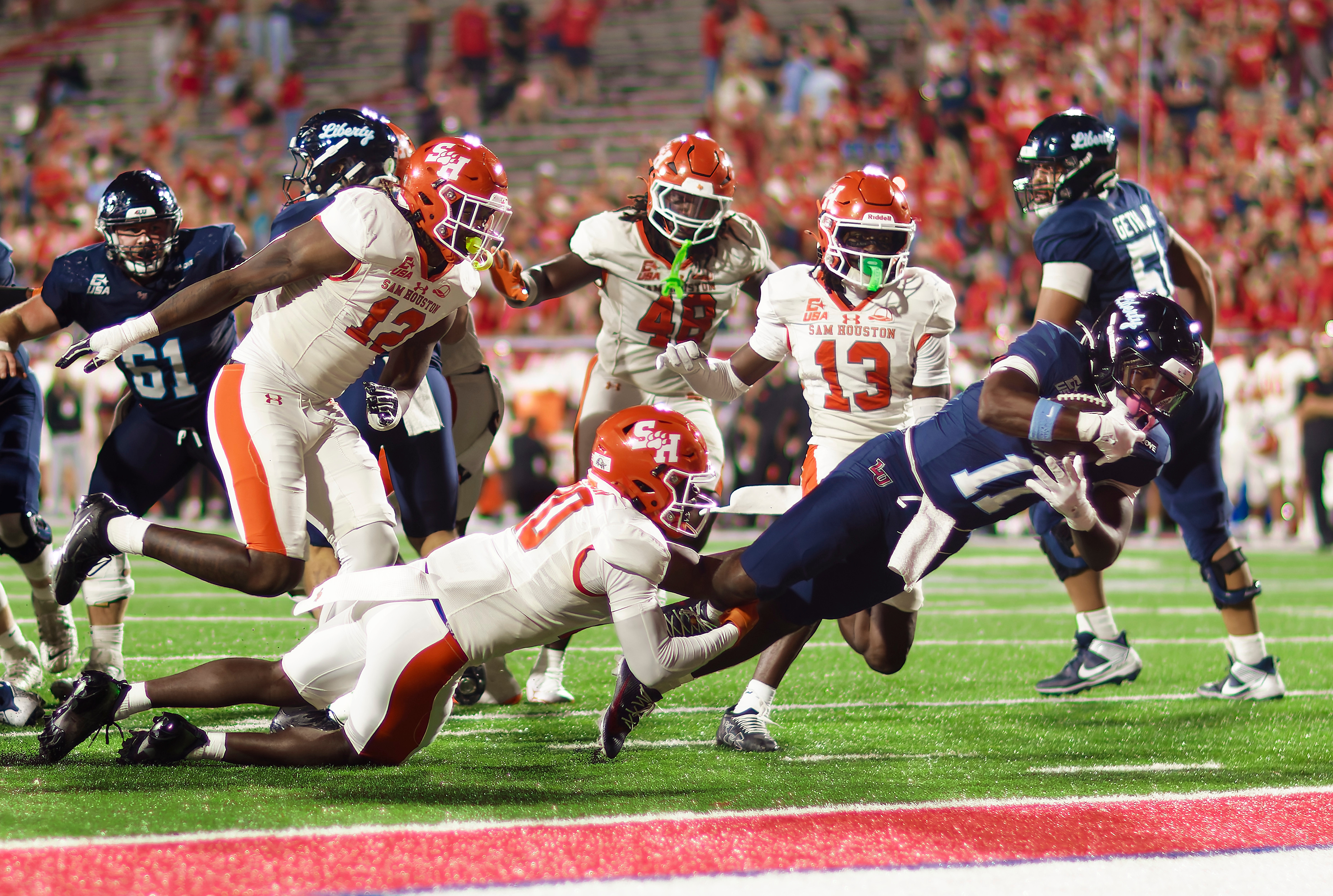Liberty carries the ball against Sam Houston
