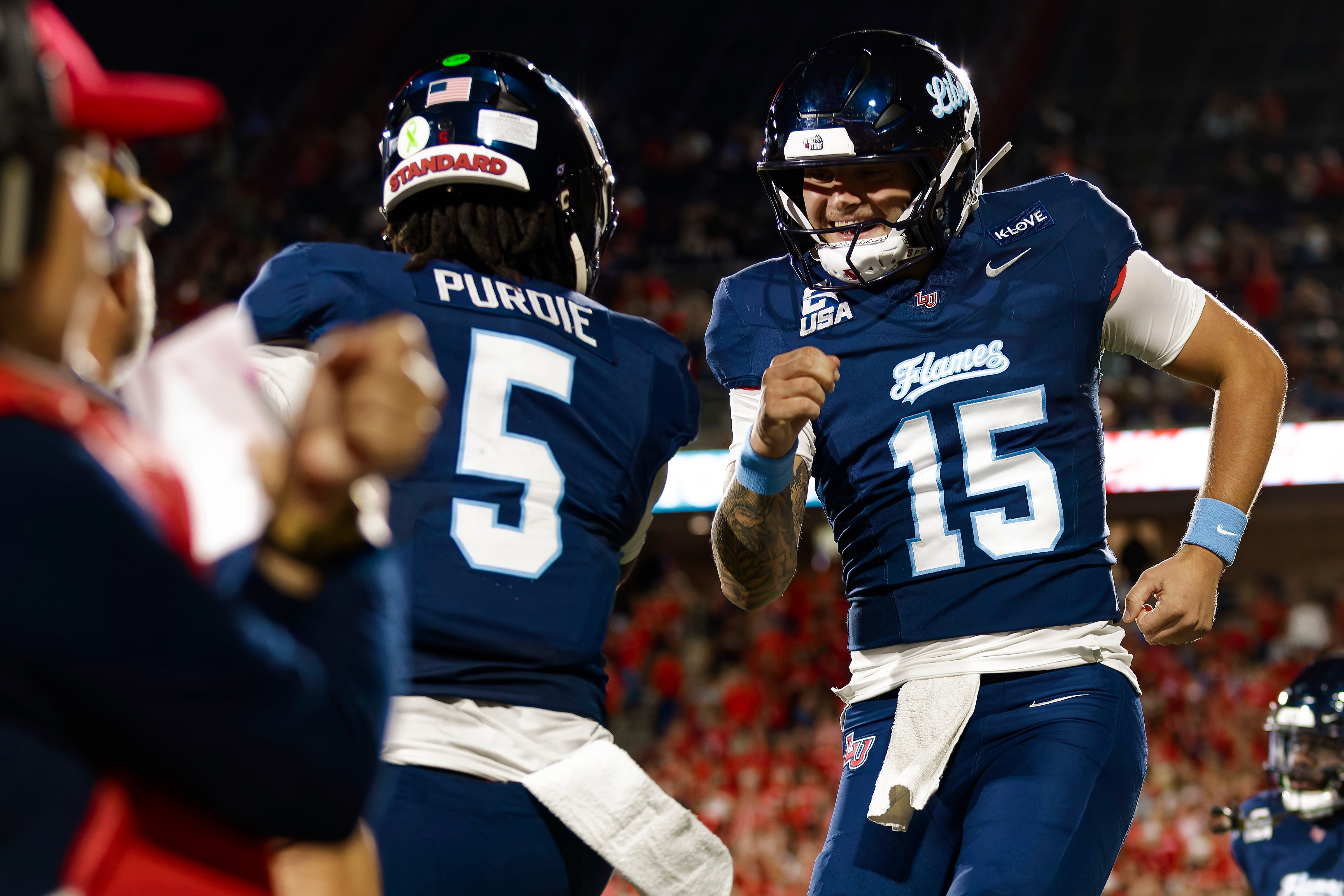 Ethan Vasko celebrates with Deshawn Purdie after a touchdown against Sam Houston