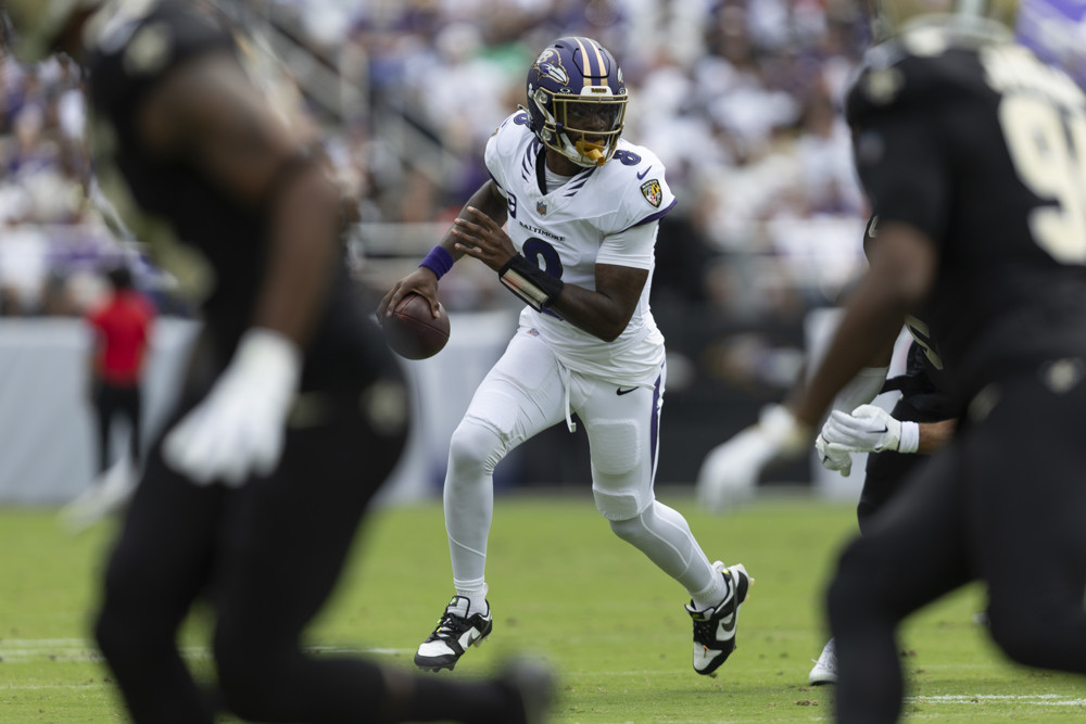 Lamar Jackson scrambles while looking for an open receiver against New Orleans.