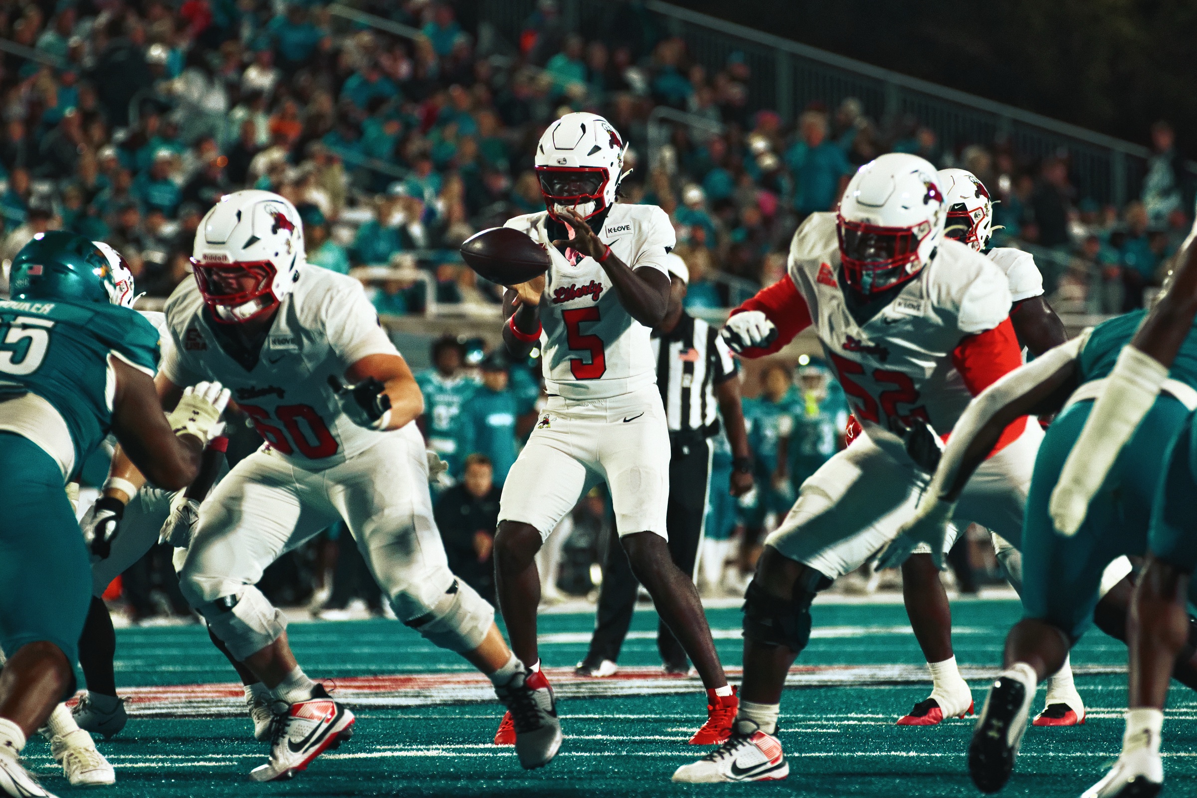 Liberty Flames Erase Halftime Deficit, Beat Coastal Carolina 34-17